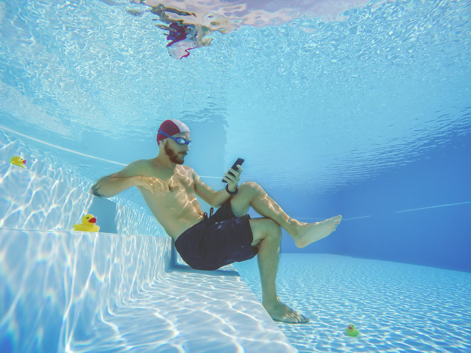 Addicted to social networking: with mobile phone underwater